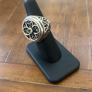 BRIGHTEN VINTAGE STERLING SILVER four leaf clover with peridot in the middle.